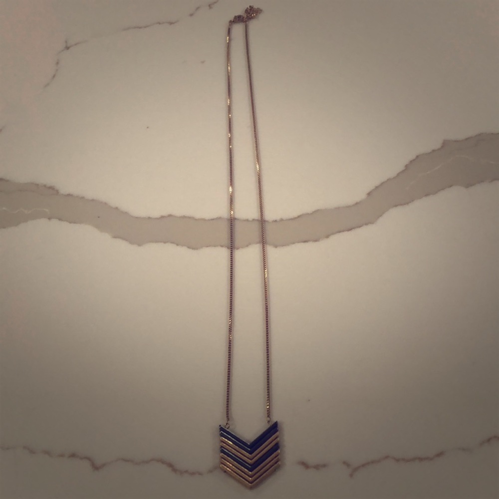 Brushed gold and gunmetal silver necklace.